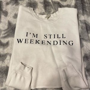 “i’m still weekending” sweatshirt